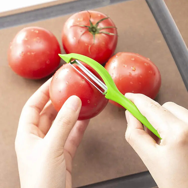 Victorinox Double Serrated Edge Universal Peeler (Green)